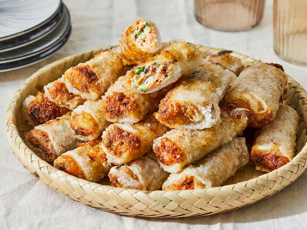 Fried vegetarian spring rolls with crispy outer layer, fragrant filling, rich in vegetable and mushroom flavor